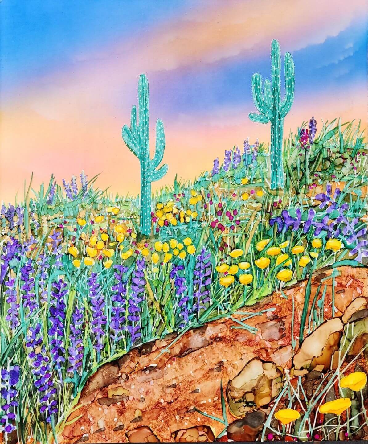 Colorful desert hillside with blooming wildflowers, saguaro cacti, and a soft pastel spring sky